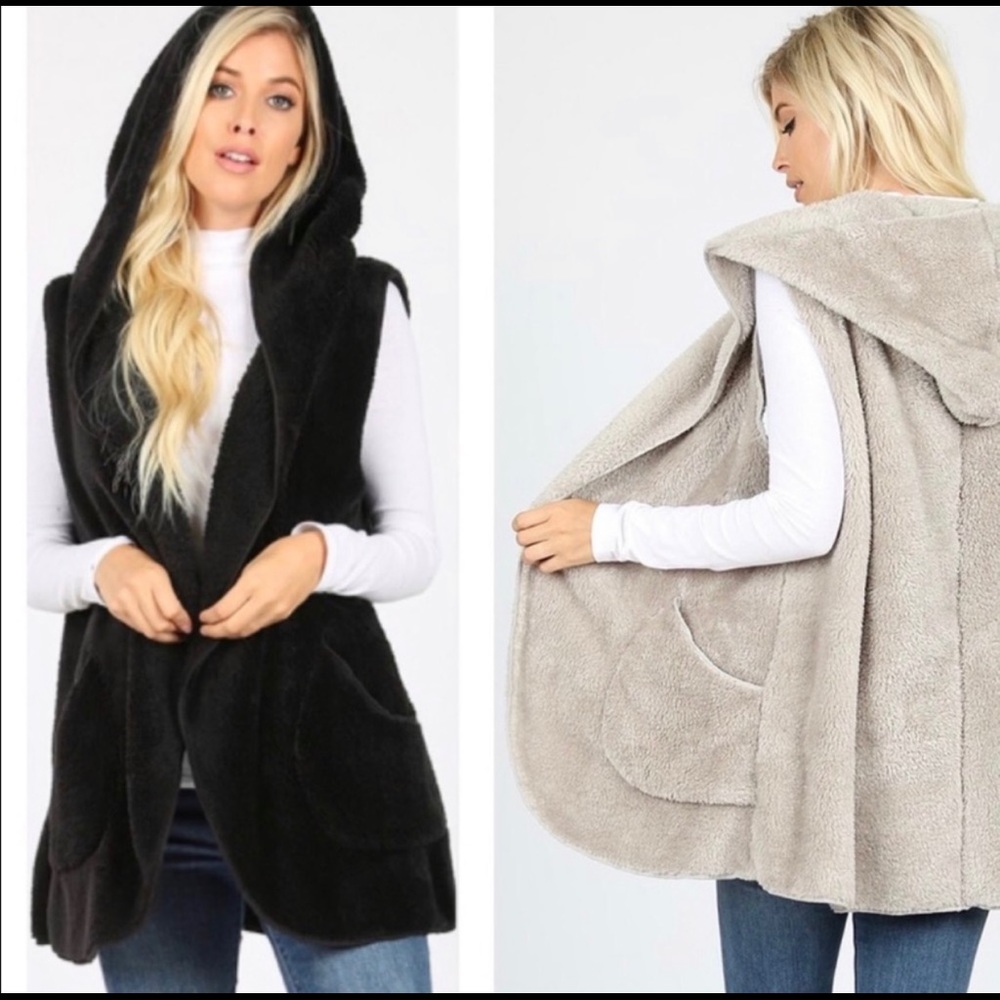 Sherpa Hooded side pocket vest. NEW with tags.